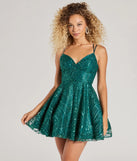Turn heads in the beaming Linda Lace-Up Glitter Sequin Skater Party Dress, a stunning emerald sequin dress designed to add sparkle and elegance to your next night out or special occasion.