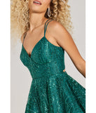 The Linda Lace-Up Glitter Sequin Skater Party Dress is a emerald green dress, an essential holiday or NYE dress that pairs chic style with versatility making it perfect for cocktail events, New Year's Eve parties, or as a winter wedding guest look.