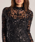 Revamp your 2025 wardrobe with this chic addition, the Kaelie Sequin Sheer Mesh Long Sleeve Mini Dress in black, perfect for elevating your style in the new year.
