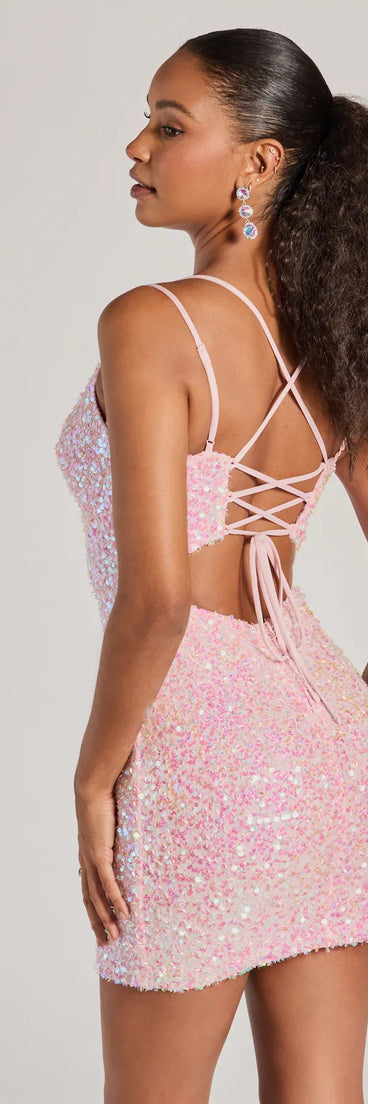 Revamp your 2025 wardrobe with this chic addition, the Davina Sequin Lace-Up Bodycon Mini Dress in pink, perfect for elevating your style in the new year.