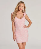 Turn heads in the beaming Nora V-Neck Ruffle Cutout Sequin Mini Dress, a stunning pink sequin dress designed to add sparkle and elegance to your next night out or special occasion.