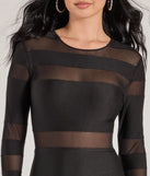 Bring high-impact style to your nightlife in the Delena Sheer Mesh Long Sleeve Bodycon Mini Dress, a bold black club dress made for dancing, parties, and unforgettable nights.