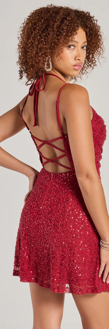 Own every entrance in the Kristine Beaded Sequin Strappy Back Skater Dress, a red party dress perfect for milestone birthdays and grad parties, or dancing through summer nights and unforgettable bachelorette celebrations.