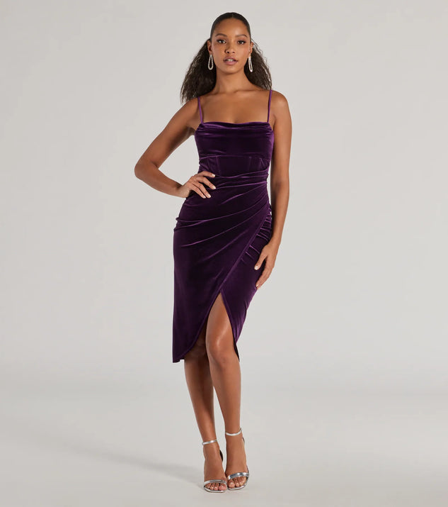 The Alice Corset Velvet Midi Formal Dress is a luxe velvet dress that offers a rich and elegant look, a stylish pick for a Military Ball gown, homecoming attire, or a wedding guest dress.