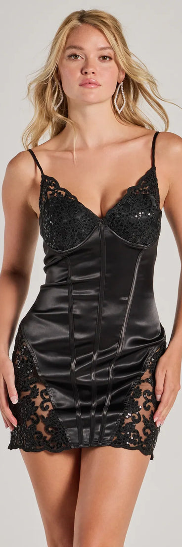 Turn heads in the beaming Jackie Sweetheart Lace Sequin Satin Mini Dress, a stunning black sequin dress designed to add sparkle and elegance to your next night out or special occasion.