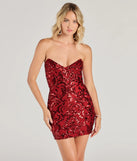 Turn heads in the beaming Lilian Sequin Strapless Lace-Up Mini Dress, a stunning red sequin dress designed to add sparkle and elegance to your next night out or special occasion.