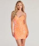 Turn heads in the beaming Lilian Sequin Strapless Lace-Up Mini Dress, a stunning orange sequin dress designed to add sparkle and elegance to your next night out or special occasion.