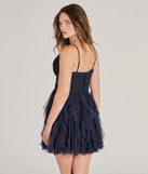 Own every entrance in the Leanna Ruffle Glitter Mesh Skater Dress, a navy blue party dress perfect for milestone birthdays and grad parties, or dancing through summer nights and unforgettable bachelorette celebrations.