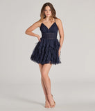 Revamp your 2025 wardrobe with this chic addition, the Leanna Ruffle Glitter Mesh Skater Dress in navy, perfect for elevating your style in the new year.