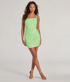 The Ashleigh One-Shoulder Bodycon Sequin Mini Dress is a dazzling white sequin dress, perfect for making a bold entrance at any event, from cocktail parties to formal celebrations.