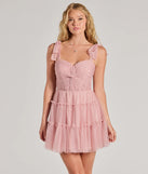Own every entrance in the Lizzy Ruffled Glitter Mesh Skater Dress, a blush party dress perfect for milestone birthdays and grad parties, or dancing through summer nights and unforgettable bachelorette celebrations.