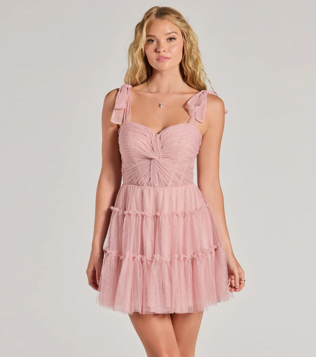 Own every entrance in the Lizzy Ruffled Glitter Mesh Skater Dress, a blush party dress perfect for milestone birthdays and grad parties, or dancing through summer nights and unforgettable bachelorette celebrations.