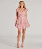 Make a bold statement in the Lizzy Ruffled Glitter Mesh Skater Dress in blush, the perfect spring dress for weddings, cocktail hours, nights out, and/or seasonal celebrations.