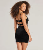 Flaunt your silhouette in the tight Misty Open-Back Velvet Mini Dress in black, a bodycon dress that empowers your look with bold style and effortless edge.