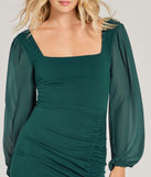 Make a bold statement in the Celeste Tie-Back Slit Crepe Midi Formal Dress in hunter green, the perfect green dress for weddings, cocktail hours, nights out, and/or seasonal celebrations.