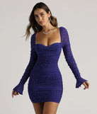 Step into seasonal chic with the Tracey Mesh Faux Pearl Bodycon Party Dress, a purple mini dress featuring an above-the-knee cut ideal for cocktail parties, festive gatherings, or clubwear.