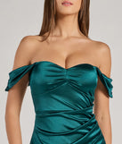The Gaia Satin Off-The-Shoulder Wrap Midi Dress in hunter is a stunning green prom dress designed to capture attention with its fresh or bold color and effortlessly stylish silhouette.
