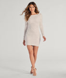 Make a bold statement in the Brea Sequin Beaded Long Sleeve Cowl Back Mini Dress in white, the perfect summer dress for weddings, cocktail hours, nights out, and/or seasonal celebrations.