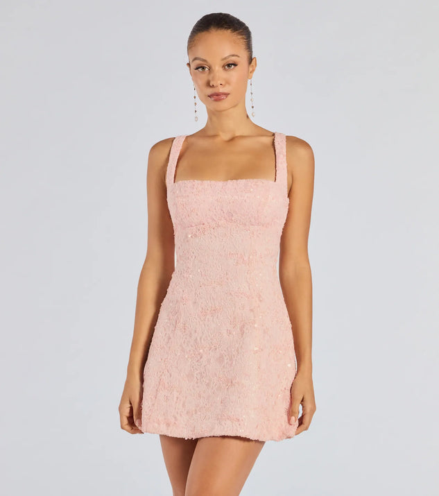 Make a bold statement in the Clarice Sequin Beaded Lace A-Line Mini Dress in pink, the perfect spring dress for weddings, cocktail hours, nights out, and/or seasonal celebrations.