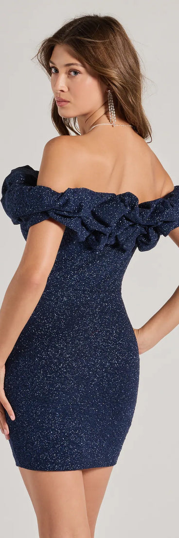Own the evening in the Ember Off-The-Shoulder Ruffle Glitter Party Dress in navy blue, a sultry cocktail dress perfect for rooftop parties and stylish soirées.