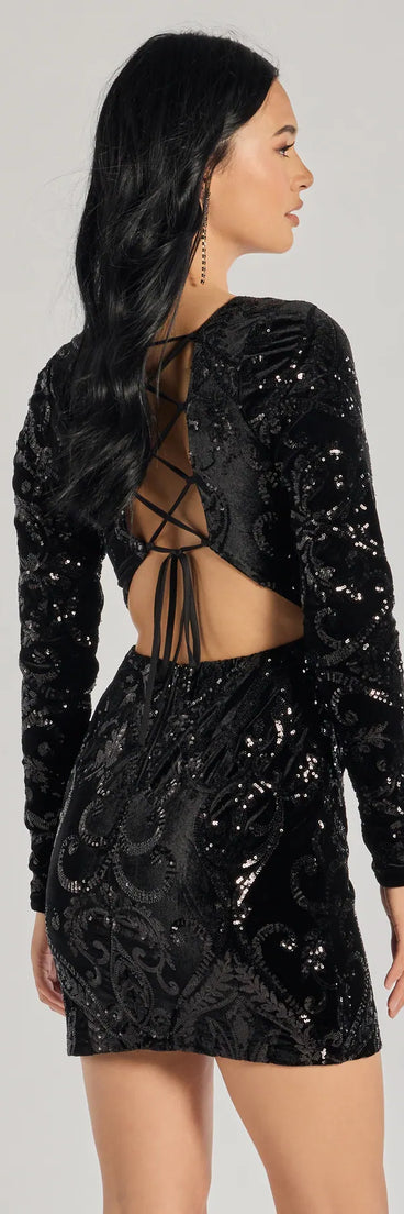 Own every entrance in the Ayden Long Sleeve Velvet Sequin Mini Dress, a black party dress perfect for milestone birthdays and grad parties, or dancing through summer nights and unforgettable bachelorette celebrations.