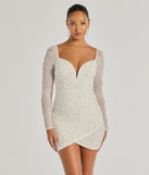Own every entrance in the Emma Faux Pearl Beaded Long Sleeve Bodycon Dress, a white party dress perfect for milestone birthdays and grad parties, or dancing through summer nights and unforgettable bachelorette celebrations.
