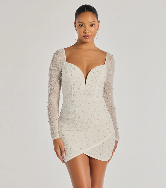 Own every entrance in the Emma Faux Pearl Beaded Long Sleeve Bodycon Dress, a white party dress perfect for milestone birthdays and grad parties, or dancing through summer nights and unforgettable bachelorette celebrations.