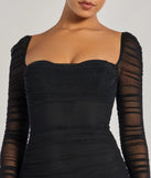 Revamp your 2025 wardrobe with this chic addition, the Kari Long Sleeve Studded Ruched Mini Dress in black, perfect for elevating your style in the new year.