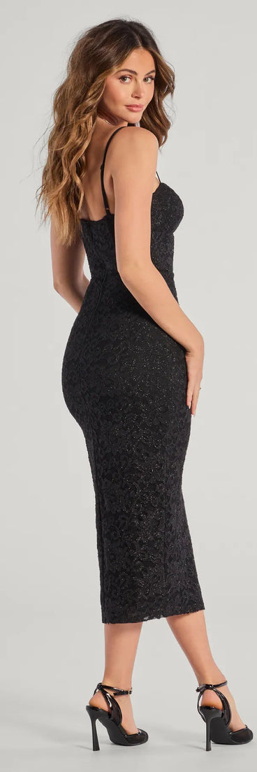 The Arlowe Glitter Lace Corset Midi Dress is a stylish black floral dress featuring a fresh seasonal print and flattering design, perfect for garden parties, bridal showers, outdoor concerts, or everyday summer styling.