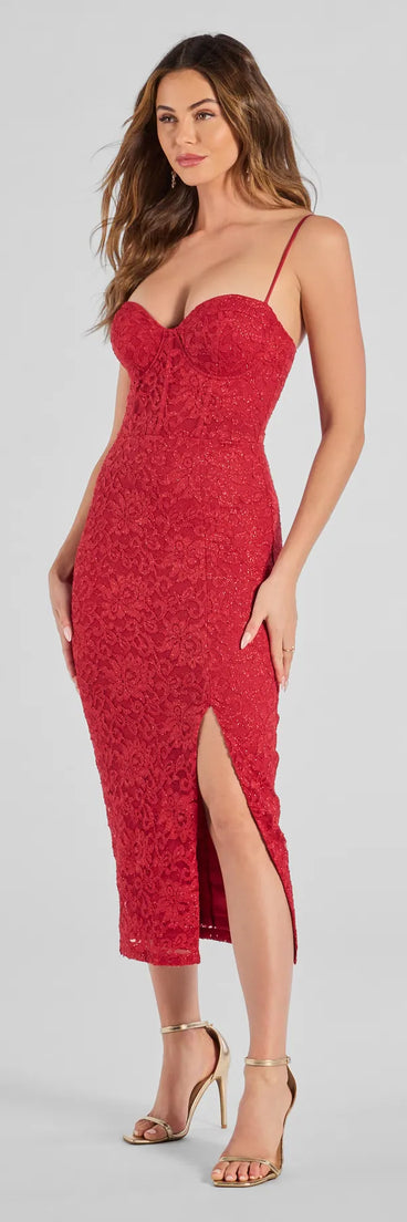 The Arlowe Glitter Lace Corset Midi Dress in red is a modern red dress featuring trendy details and a stunning design ideal for wedding guest dresses, elegant cocktail looks, or an alluring birthday dress.