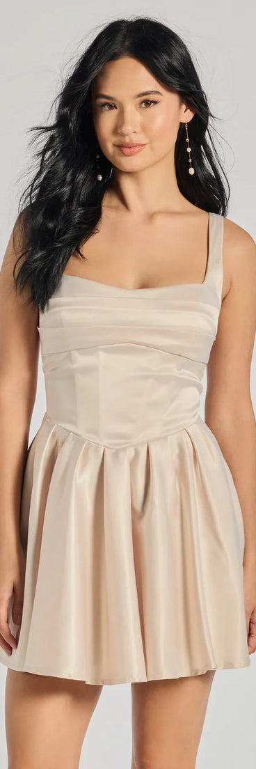 Own every entrance in the Twila Satin Lace-Up Corset Skater Dress, a gold party dress perfect for milestone birthdays and grad parties, or dancing through summer nights and unforgettable bachelorette celebrations.