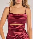 Make a statement in the Lilith Satin Cutout Wrap-Front Midi Dress in wine, a bold red prom dress designed to exude confidence, elegance, and a striking prom-night look.