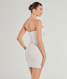 Flaunt your silhouette in the tight Fatima Strapless Beaded Bodycon Mini Dress in ivory, a bodycon dress that empowers your look with bold style and effortless edge.