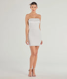 Make a bold statement in the Fatima Strapless Beaded Bodycon Mini Dress in ivory, the perfect spring dress for weddings, cocktail hours, nights out, and/or seasonal celebrations.