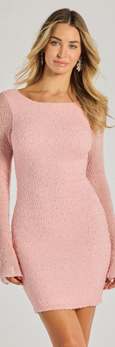 Bring a fun and feminine vibe with the Shea Pearl Beaded Long Sleeve Mini Dress, a scroll-stopping style from Windsor's pink homecoming dress collection that brings playful charm to every HOCO moment.