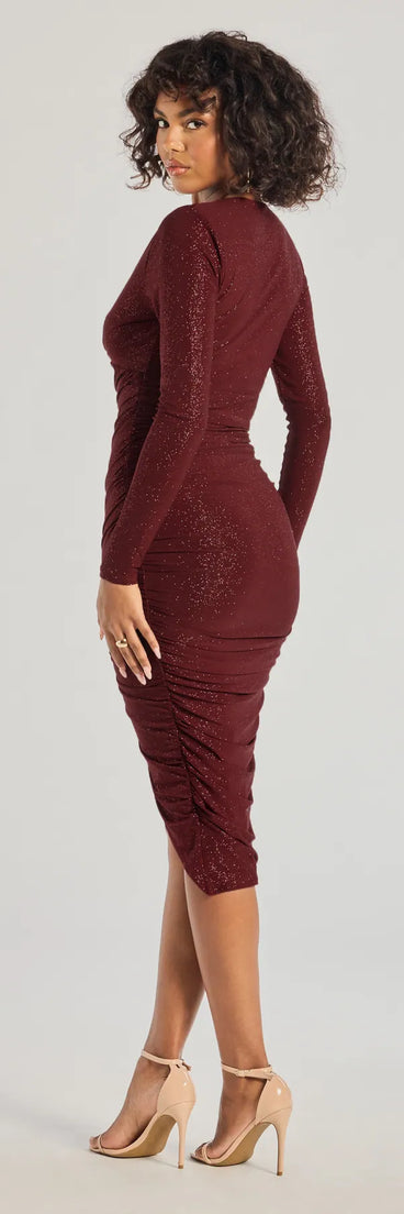 Feel instantly put-together in the Rhea Long Sleeve Wrap Glitter Midi Dress in burgundy, a summer wedding guest dress designed for confident style and all-out celebration.