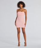 Make a bold statement in the Lena Strapless Bodycon Beaded Mesh Mini Dress in pink, the perfect spring dress for weddings, cocktail hours, nights out, and/or seasonal celebrations.