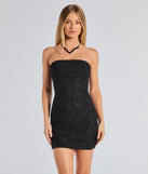 The Lena Strapless Bodycon Beaded Mesh Mini Dress is a show-stopping black prom dress, offering a sleek, slimming silhouette that enhances your natural beauty for an unforgettable night.