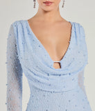 Turn heads at Prom 2025 in this light blue prom dress, where statement-making details meet the iconic style of the Bianca Long Sleeve Faux Pearl Beaded Mini Dress.
