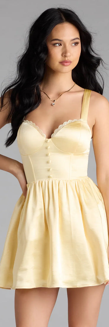 Feel instantly put-together in the Kimmie Lace-Up Corset Satin Skater Dress in yellow, a fall wedding guest dress designed for confident style and all-out celebration.