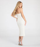 Make a bold statement in the Kris Strapless Bodycon Beaded Midi Formal Dress in ivory, the perfect spring dress for weddings, cocktail hours, nights out, and/or seasonal celebrations.