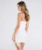 Flaunt your silhouette in the tight Camille Beaded Sequin Bodycon Mini Dress in ivory, a bodycon dress that empowers your look with bold style and effortless edge.