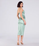 Flaunt your silhouette in the tight Kiley Cowl Neck Wrap Satin Midi Formal Dress in sage green, a bodycon dress that empowers your look with bold style and effortless edge.