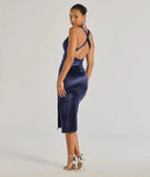 Step into the Prom 2025 dance in the Abigail V-Neck Strappy Satin Midi Dress in navy, a stunning blue prom dress designed to complement any theme with its timeless allure and statement-making style.