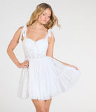 Feel confident and photo-ready in the Cathy Sweetheart Corset A-Line Lace Short Dress, a white graduation dress perfect for 2025 ceremonies and parties.