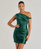 Feel instantly put-together in the Marleigh Satin Off-Shoulder Mini Dress in hunter green, a stylish wedding guest dress designed for confident style and all-out celebration.