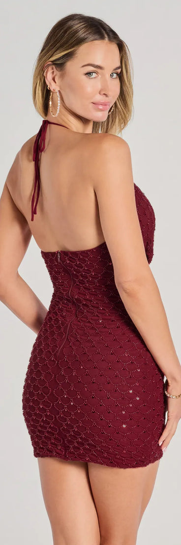 Bring high-impact style to your nightlife in the Hadley Halter Cowl Neck Beaded Bodycon Mini Dress, a bold burgundy club dress made for dancing, parties, and unforgettable nights.