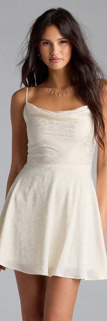 Celebrate in style with the Jianna Floral Satin Short A-Line Dress, a ivory holiday dresses standout that brings bold, festive flair and a party-ready look.