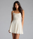 Own every entrance in the Jianna Floral Satin Short A-Line Dress, a ivory party dress perfect for milestone birthdays and grad parties, or dancing through summer nights and unforgettable bachelorette celebrations.