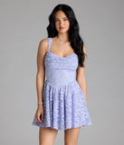 Step into summer looking effortlessly chic in the Selina Cutout Back Lace Glitter Skater Dress in periwinkle, a must-have Windsor dress for your warm-weather wardrobe.